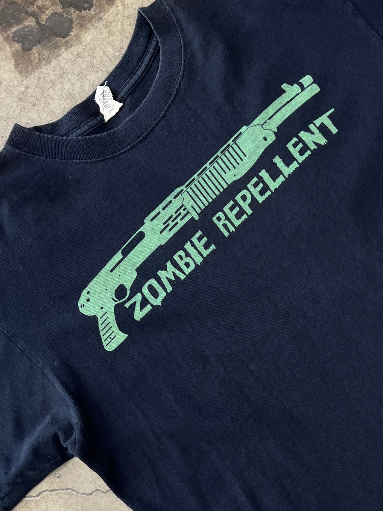 Resident Evil Zombie Repellent Anvil Tee