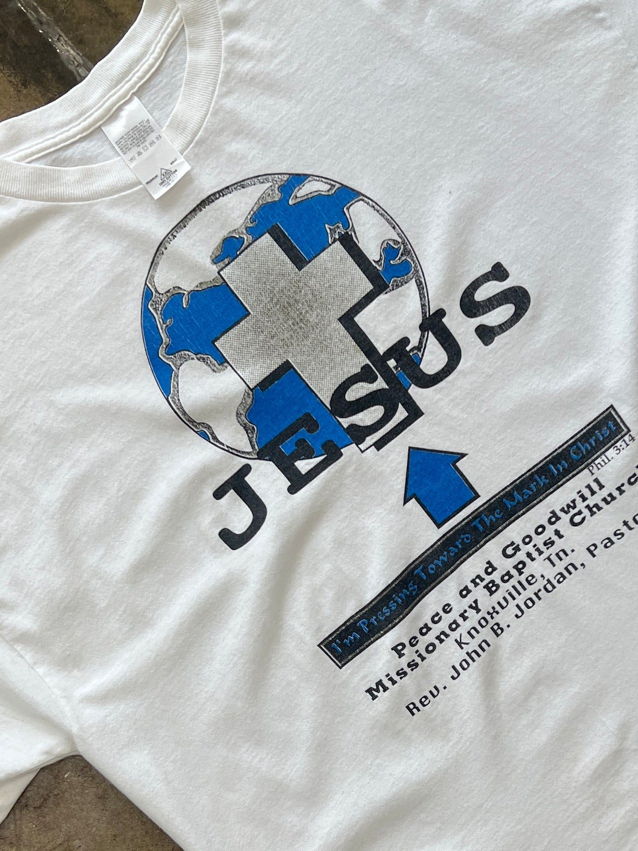 Peace and Goodwill Mark in Christ Jesus Earth Religious Tee