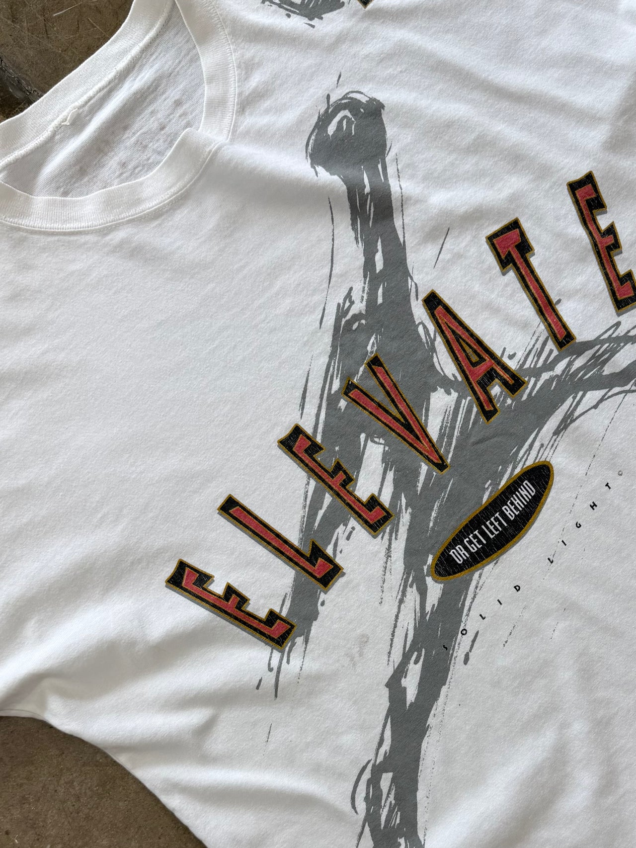 Rise With the Most High God Elevate Jesus Solid Lights Basketball Tee