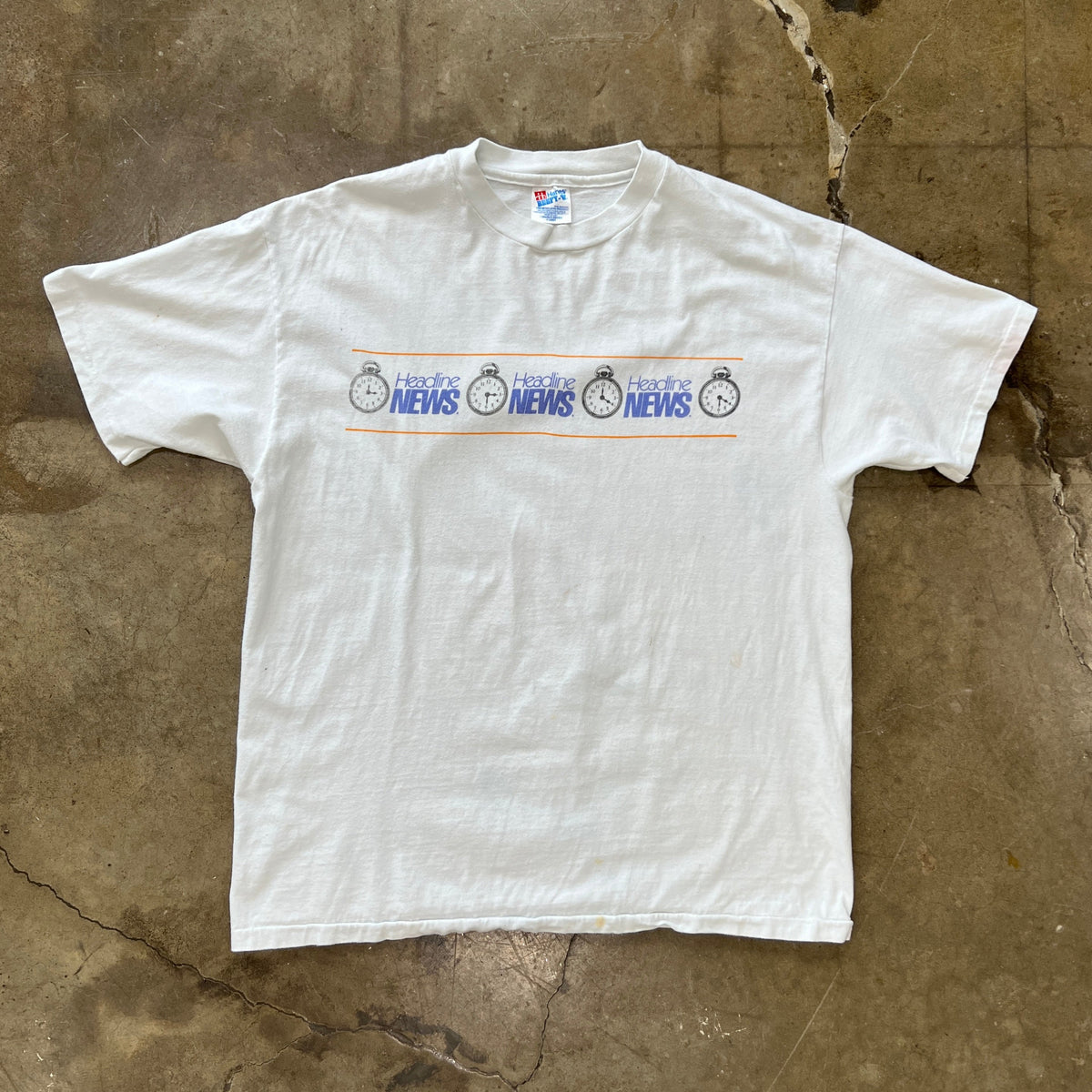 90s Headline News Stopwatch Wrap Graphic Single Stitch Tee