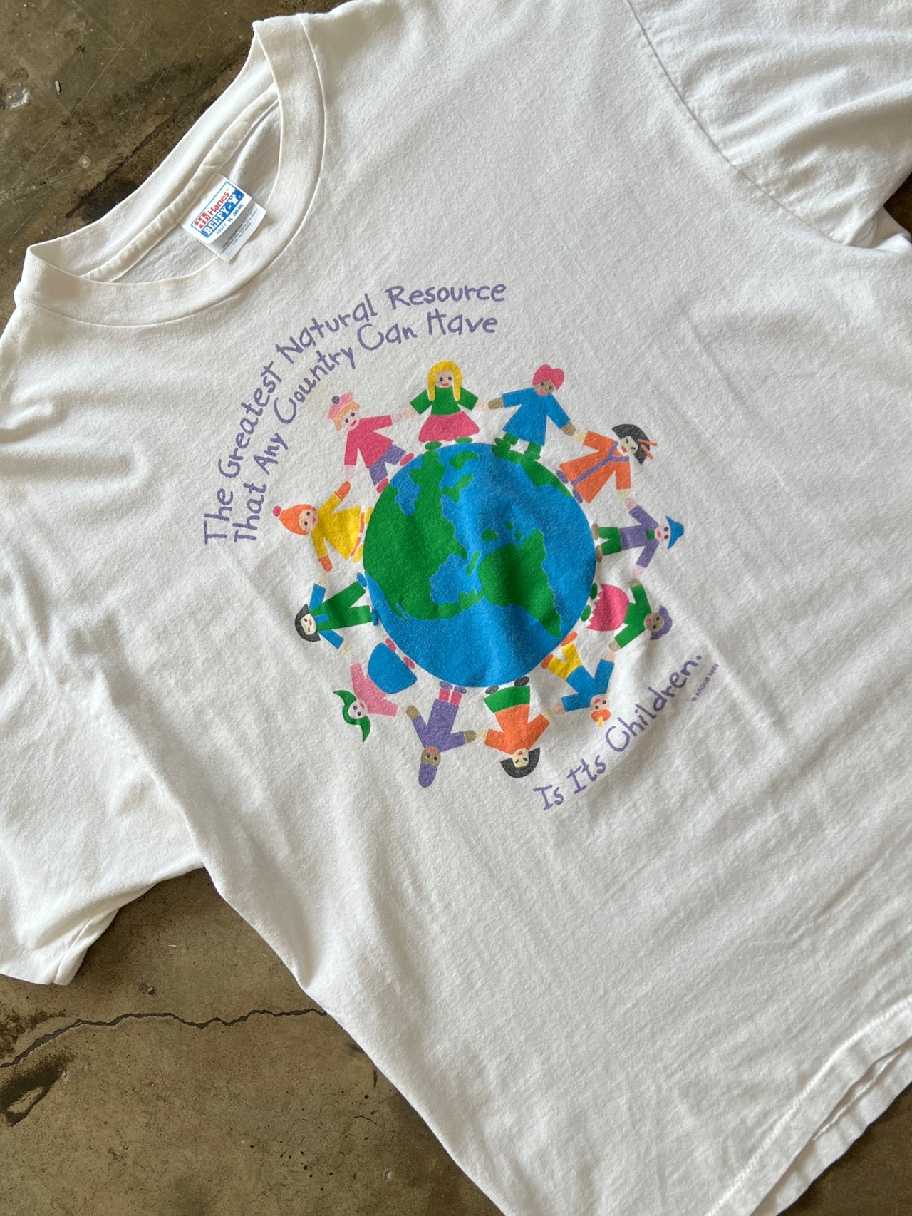 Children Around the World Natural Resource Tee