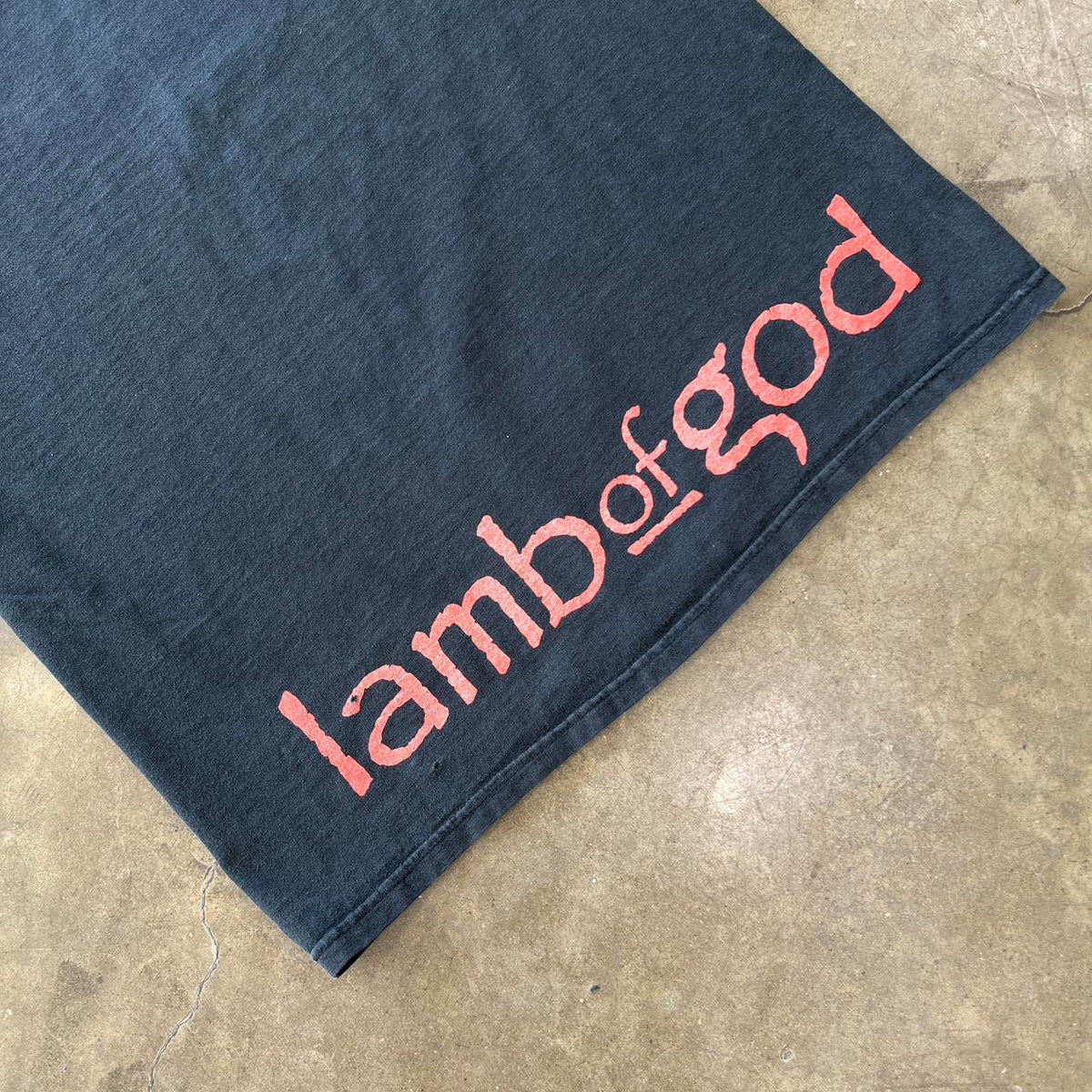 Lamb of God Again We Raise Tee